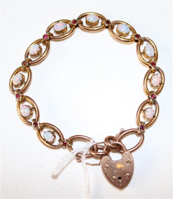 9ct gold, opal and ruby oval link bracelet with padlock clasp